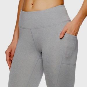 Reebok high rise gray heather leggings side pockets and mesh inserts large